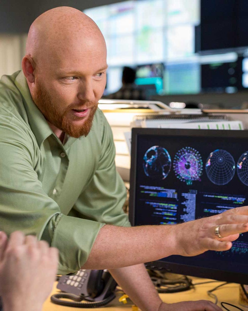 Man working in cybersecurity office